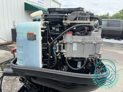 2013 Mercury Optimax Pro XS 115 HP engine with cowling removed showing clean powerhead