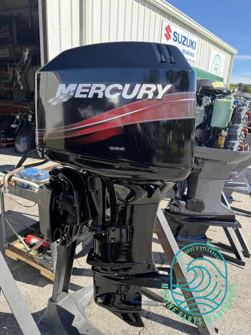 Used 2005 Mercury 50 HP three-cylinder carbureted two-stroke outboard motor with 20-inch shaft and rebuilt powerhead