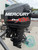 Port side view of 2013 Mercury Optimax Pro XS 115 HP outboard motor
