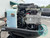 2013 Mercury Optimax Pro XS 115 HP engine with cowling removed showing clean powerhead