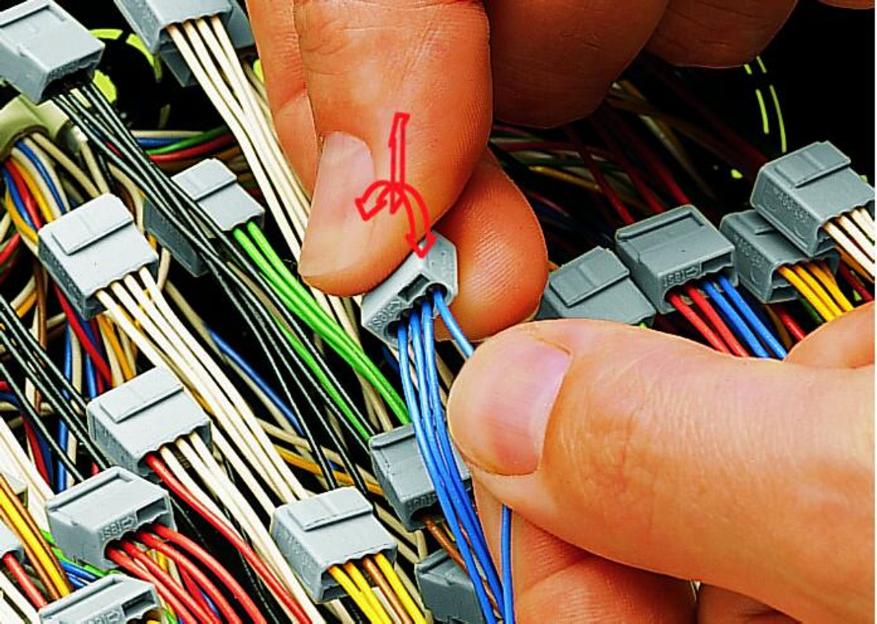 Wire Removal- Hold Conductor to be removed and twist alternating between left and right while pulling the connector