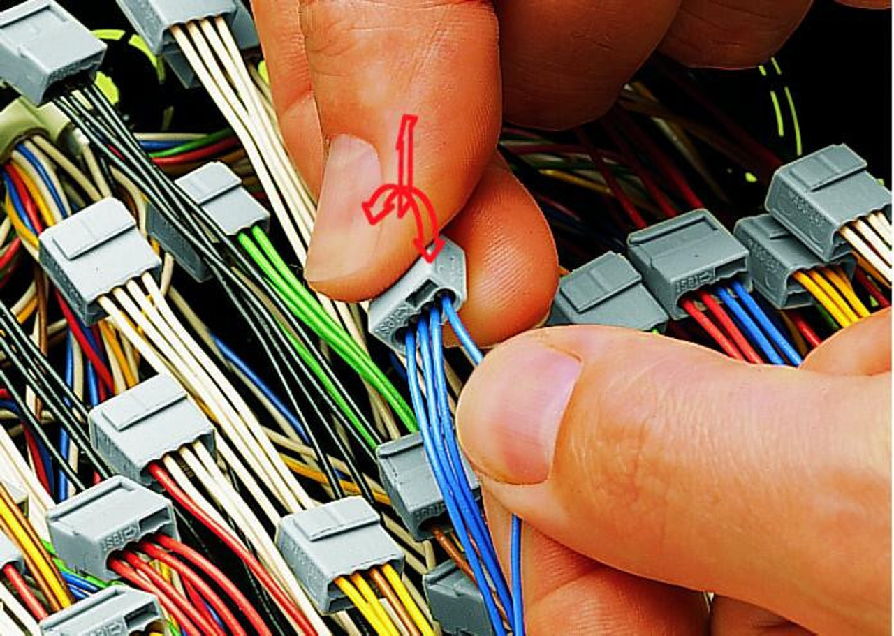 Wire Removal- Hold Conductor to be removed and twist alternating between left and right while pulling the connector