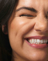 Versatile Bronze Shade + Sculpt Refill - closeup of model wearing Mocha bronzer