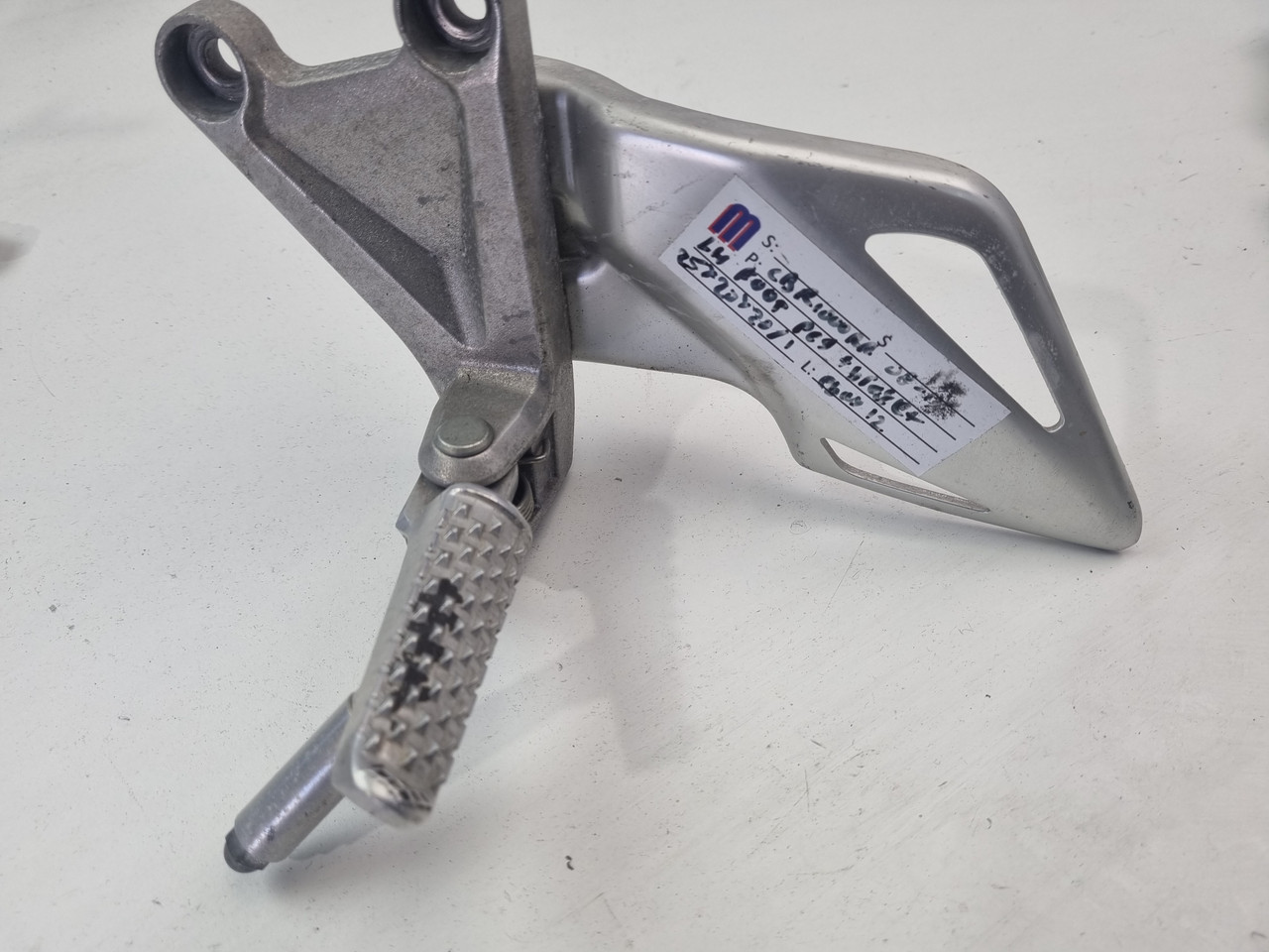 LH Foot peg mount plate Honda CBR1000RR 08-09 50700-MFL-000 - Bike