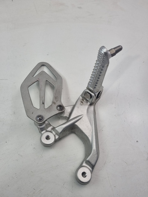 OEM LH Foot peg  plate bracket mount  BMW S1000RR 14-18 46717728307 OEM LH Foot peg  plate bracket mount  BMW S1000RR 14-18 46717728307