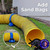 Yellow dog agility tunnel with black protective ribs