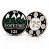 Close-up of a LoCo Skate Shop $25 metal gift coin on a white background, featuring the LoCo Skate Shop logo, mountain-style lettering, Longmont Colorado text, and silver, black, white, and blue enamel details.