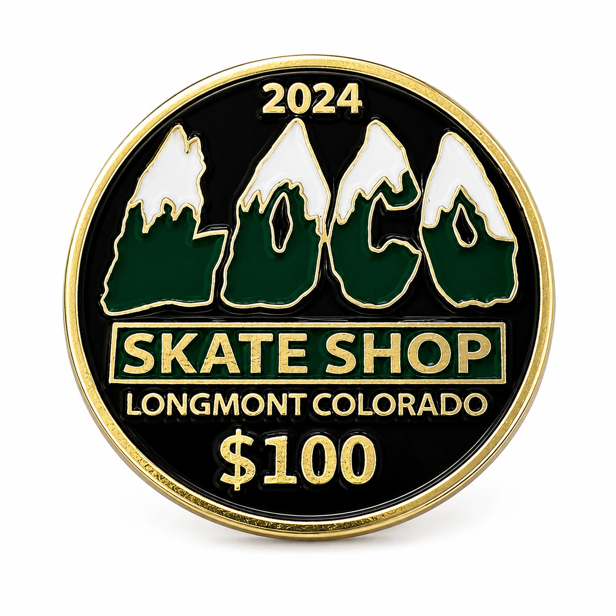 Close-up of a 2024 LoCo Skate Shop $100 coin on a white background, featuring snowy mountain-style “LOCO” lettering above “Skate Shop,” “Longmont Colorado,” and “$100” in gold, green, black, and white