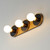 Hollywood Three Light Wall Sconce (26093BKNAB)