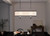 Heddle Eight Light Linear Chandelier (52467BKT)