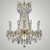 manufacturer_finish:Polished Brass with Black Inlay|light_source:Incandescent|crystal:O - Precision Clear Oval Crystal