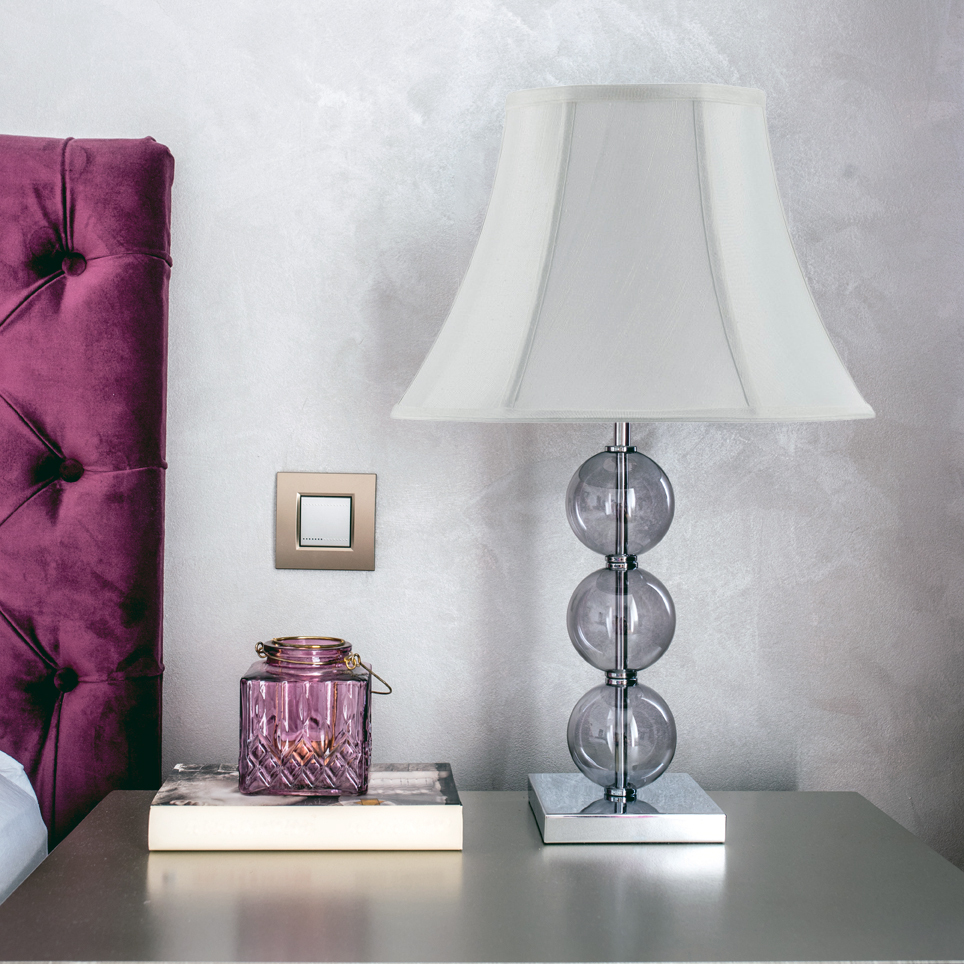 Bell lamp shades on display