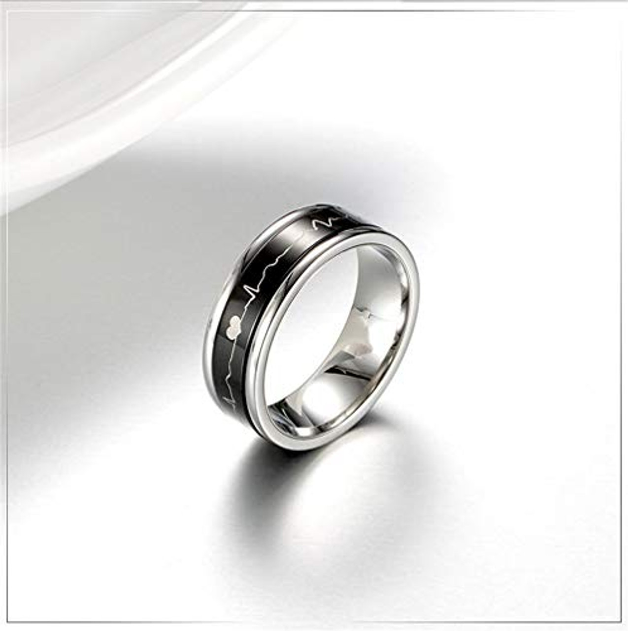 (7mm)  Unisex, Women's or Men's Stainless Steel Wedding ring band. Silver Tone with Black Rotating Spinner Heart Line EKG Heart Beat Center Style Design Ring