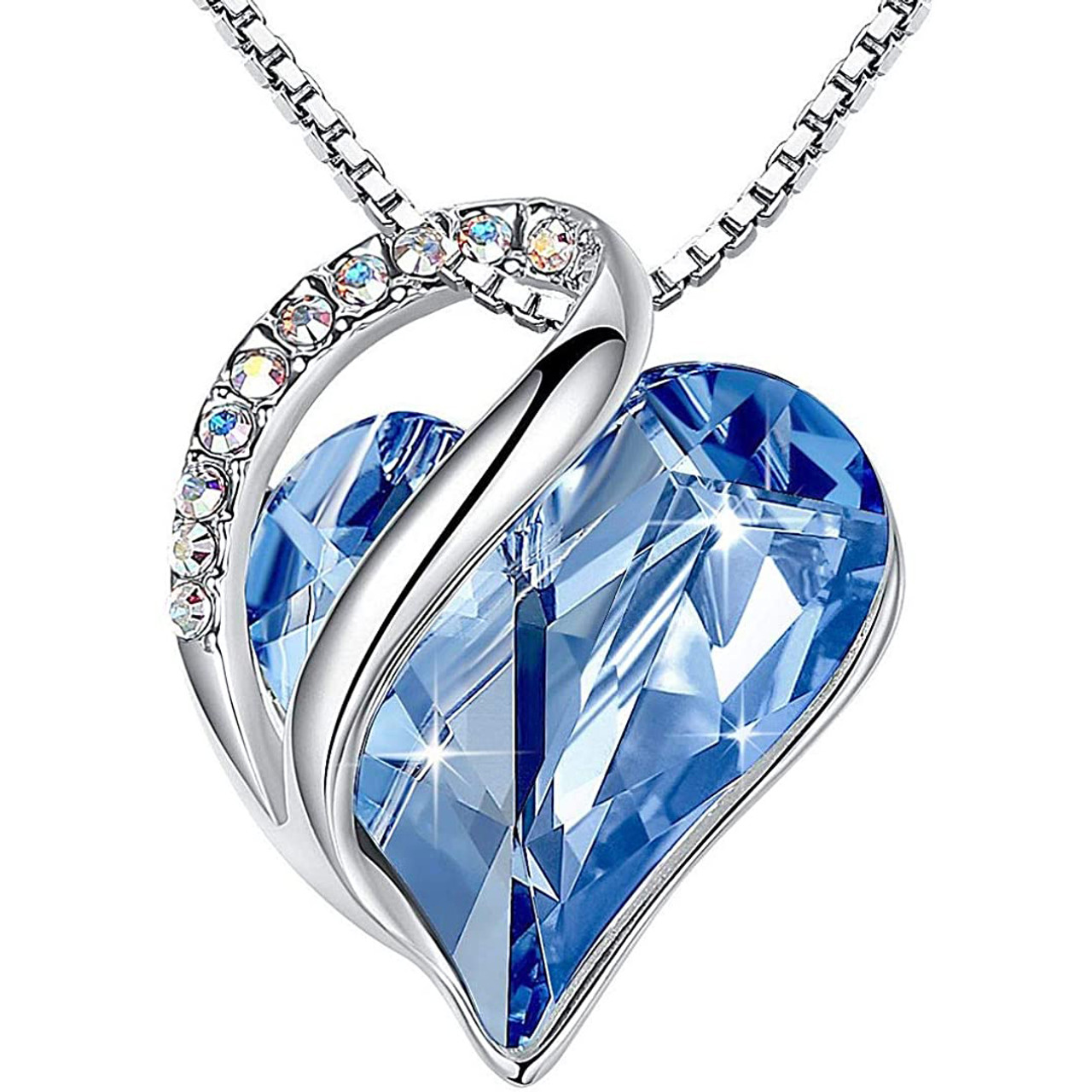 December Birthstone - Sky Light Blue Sapphire Looped Heart Design