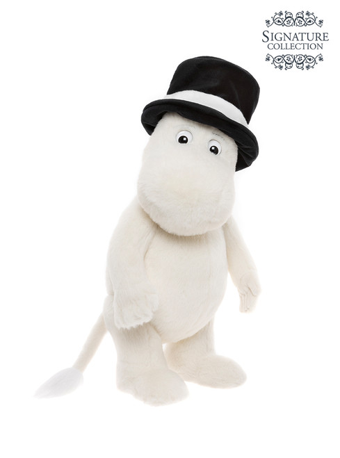 A white plush Moomin character toy stands upright wearing a black top hat with a white band, against a plain white background.