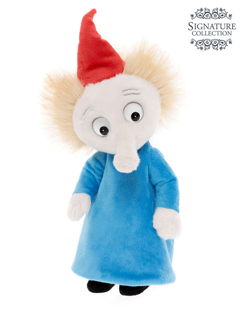 A plush elephant toy stands upright wearing a blue dress and red pointed hat, with wild blonde hair and googly eyes, set against a white background.