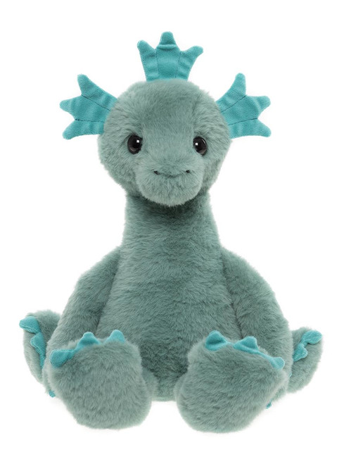 A teal/sage green dragon plush toy sits upright against a white background, featuring darker teal spines, claws, and tail tip, with a long neck and glossy black eyes.