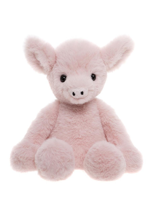 A pink plush pig teddy bear sits upright against a white background, featuring large rounded ears, small black eyes, a snout, and a long tail.