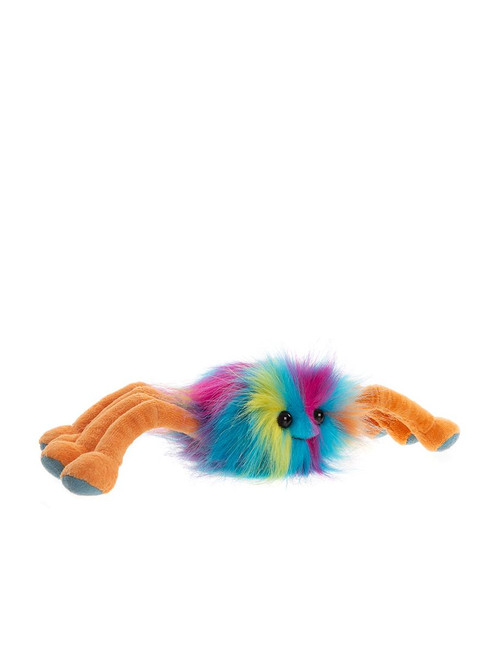 A rainbow-coloured fluffy spider plush toy with orange legs and blue-tipped feet, lying flat against a white background, with a small smiling face.