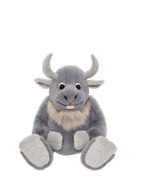A grey plush bull teddy bear sits upright against a white background, featuring curved horns, a cream chest tuft, a single tooth, and large hooved paws.