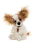 A white and brown fluffy dog-shaped Charlie Bear plush toy sits upright against a white background, wearing a small brown bead necklace, with large tufted ears.