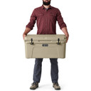 Model Holding the Cooler Image of the Yeti Tundra 65 Hard-Sided Cooler.