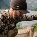 Lifestyle Image of the First Lite Rugged Wool Brimmed Beanie.