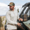 Lifestyle Image of the First Lite ThermaGrid Merino Henley.