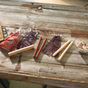 In use image of the LEM 17mm Collagen Casings Mahogany, 2 Count.