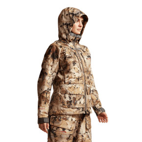 Sitka Women's Hudson Jacket Front Angled Model Image in Optifade Waterfowl Marsh