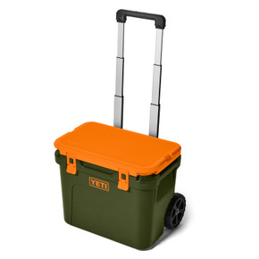 Image of the Yeti Roadie 32 Wheeled Cooler in Olive/King Crab Orange