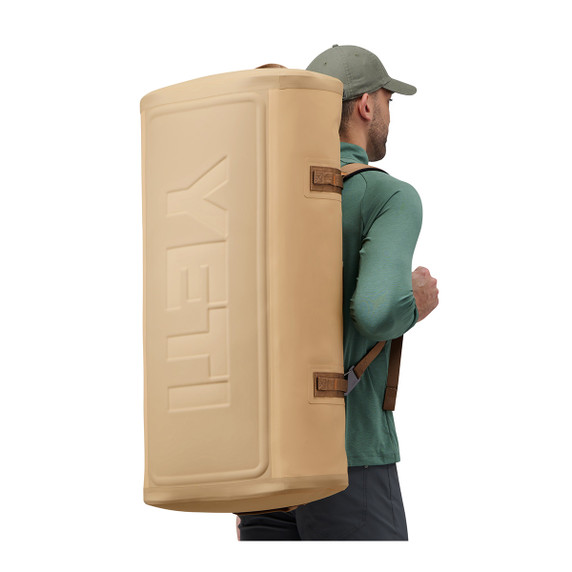 Yeti Panga 100L Waterproof Duffel Backpack Model Image in Tan