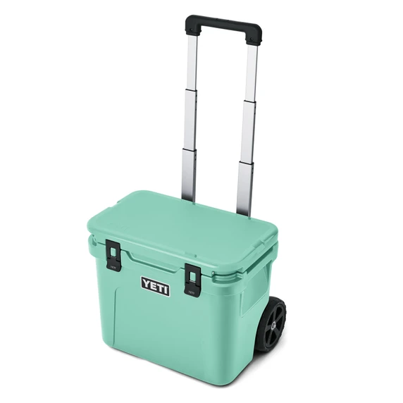 Image of the Yeti Roadie 32 Wheeled Cooler in Seafoam