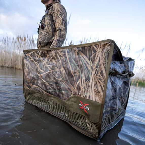 Avian-X Floating Slotted Decoy Bag - Mossy Oak Shadow Grass Lifestyle Image