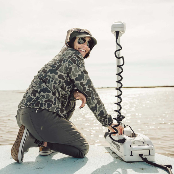 Model on Boat Image of the LaCrosse Women's 6" Alpha Deck Boot.