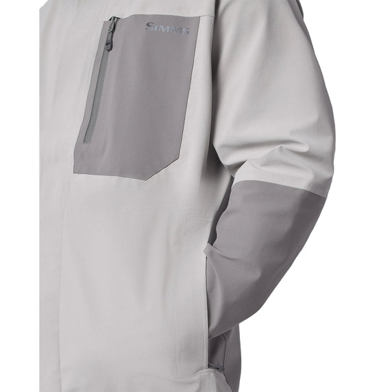 Front pocket of Simms Challenger Fishing Jacket.