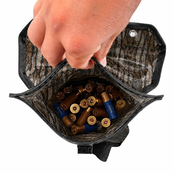 Inside with Shells Image of the Dry Pocket Waterproof Floating Shell Bag.