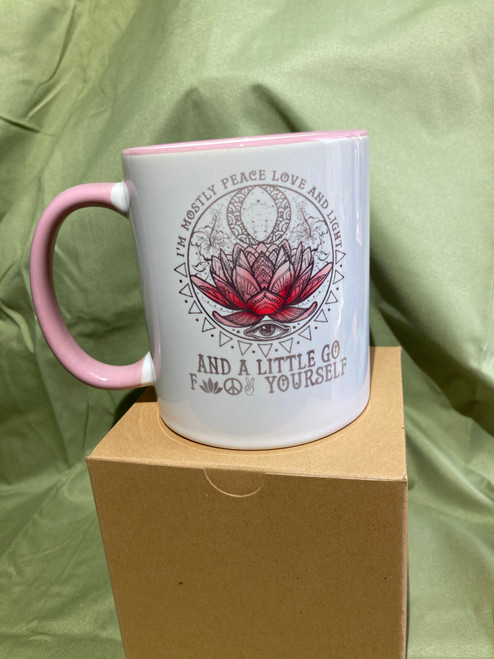 Mostly Love Light and Happiness, a little Go Fuck Yourself Lotus on mug. Pink handle.