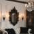 AimtoHome 3-Arm Gothic Wall Sconce Set of Two, Victorian Metal Candle Holder for Taper Candles, Wrought Iron Fleur-de-Lis Wall Mounted Candelabra with Vintage Backplate, Black Antique Iris Decor