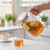 1 Gallon Circular Glass Pitcher with Lid, Round Teapot with a Handle and Raised Floral Pattern, Lid, Heat Resistant Material, Ideal for Refrigerator Storage of Iced Tea, Coffee, Juice