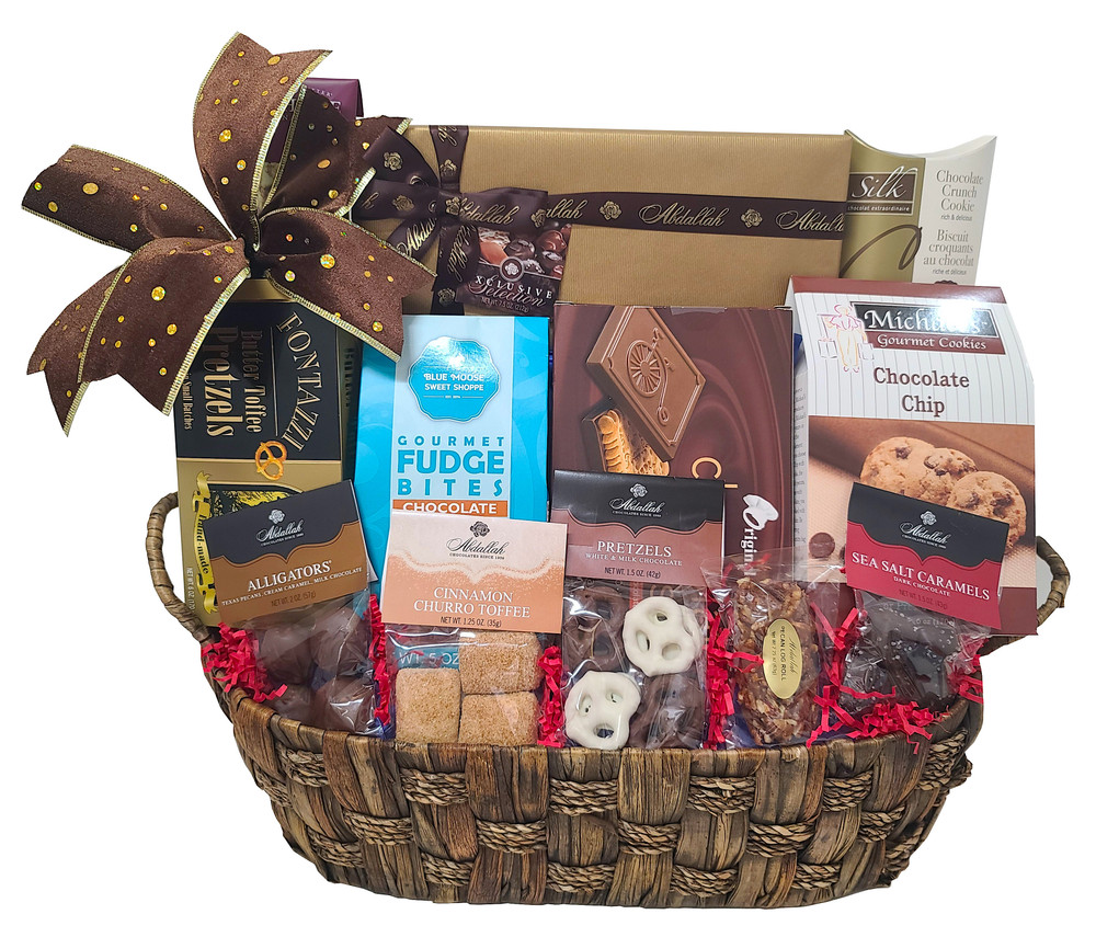 A handsome large container filled with the most decadent chocolates, cookies and desserts around! Includes an elegant box of assorted chocolates, chocolate pretzels, chocolate chip cookies, chocolate covered cookies, chocolate sea salt caramels, toffee pretzels, chocolate crunch cookie, fudge bites, cinnamon churro toffee, and chocolate alligators. 

Items of equal or greater value may be substituted depending on availability and the discovery of great new products. Other desserts will be substituted  during warm weather.