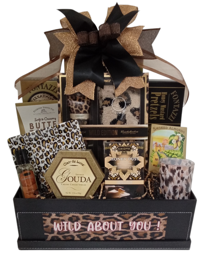 This striking design is brimming with delicious goodies and animal print gift items. The elegant gift box makes a great organizer for pictures, jewelry, scarves, collectables and keepsakes. Includes: Great romantic gift, Valentine's Day, Proposal basket and I Love You.

Animal print cozy socks
Animal print plate
Almonds
Cheese
Massage lotion
Butter toffee pretzels
Animal print candle holder
Honey Mustard Pretzels
Honey dust and feather duster
Chocolate
Hand cream
Items of equal or greater value may be substituted depending on availability and the discovery of great new products