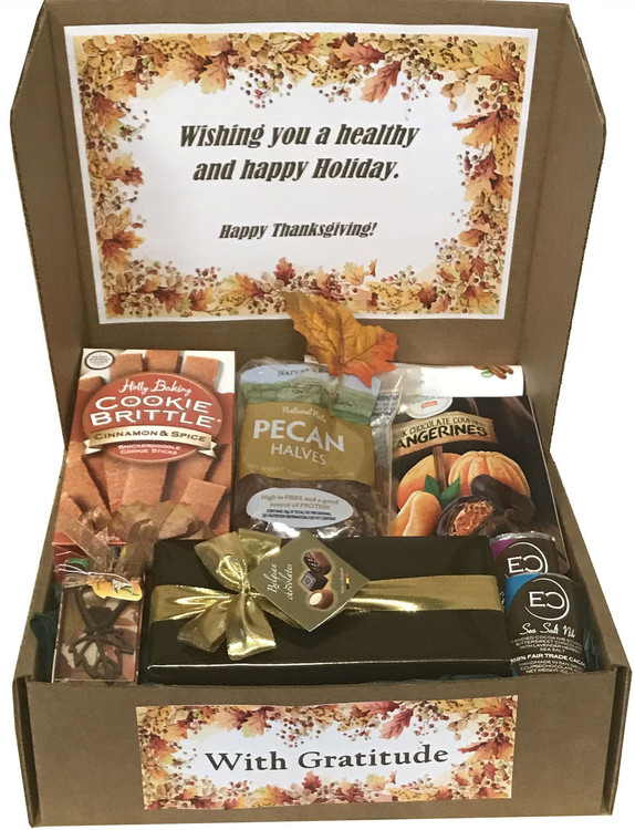 A beautifully presented, delicious surprise and nice greeting when they open their  gift box! Includes Cinnamon Spice Cookies (Gold Medal Winner), A gift wrapped box of Belgian Chocolates, all natural Pecans, Dark Chocolate Covered Tangerines, two Eclipse Chocolate Bars, and a copper Fall Leaf Bottle Opener. Great Fall and Thanksgiving gift.