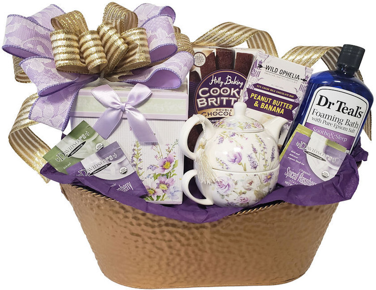 A beautiful porcelain tea for one set (teapot and tea cup)
A matching keepsake gift box filled with assorted teas and chocolate chip cookies
Delicious double chocolate cookies
Chocolate confections
Lavender foaming bubble bath
A lavender Hand Cream Mini
A beautiful gift for any occasion! Great for Mother's Day!
Items of equal or greater value may be substituted depending on availability and the discovery of great new seasonal items.