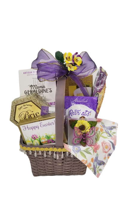 A Victorian style basket filled with Brie cheese, crackers, almonds, Cinnamon pecan cookies, chocolates, tea, biscotti, and decorative enhancements is sure to delight!