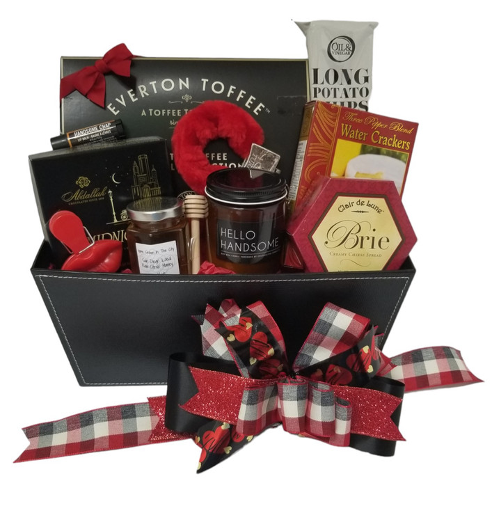 A striking design featuring a "Hello Handsome!" candle and sweet and savory assortment in a leatherette container. Includes, cheese, crackers, long chips, dark chocolate, toffee pretzels and honey.

items of equal or greater value may be substituted depending on availability and the discovery of great new products.