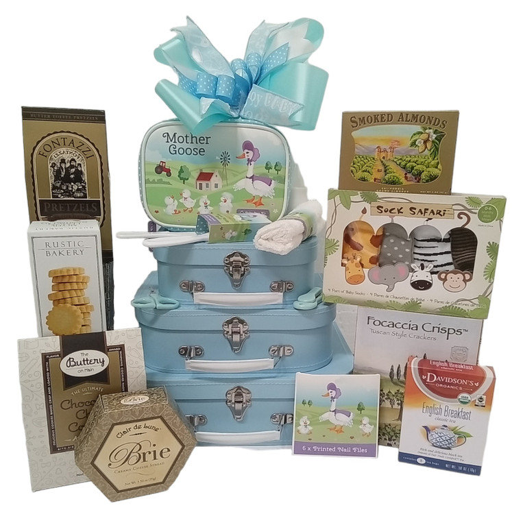 Three adorable suitcase style containers that make great decorative organizers in the nursery. They are filled with sweets and snacks for mom and dad to share and for the baby we have included a set of Safari Socks and a Mother Goose Grooming Kit imported from England. Perfect for a baby shower or new baby gift. can be hand delivered in San Diego or shipped nation wide.
Items of equal or greater value may be substituted depending on availability and the discovery of great new products. Call to arrange a custom designed baby basket.