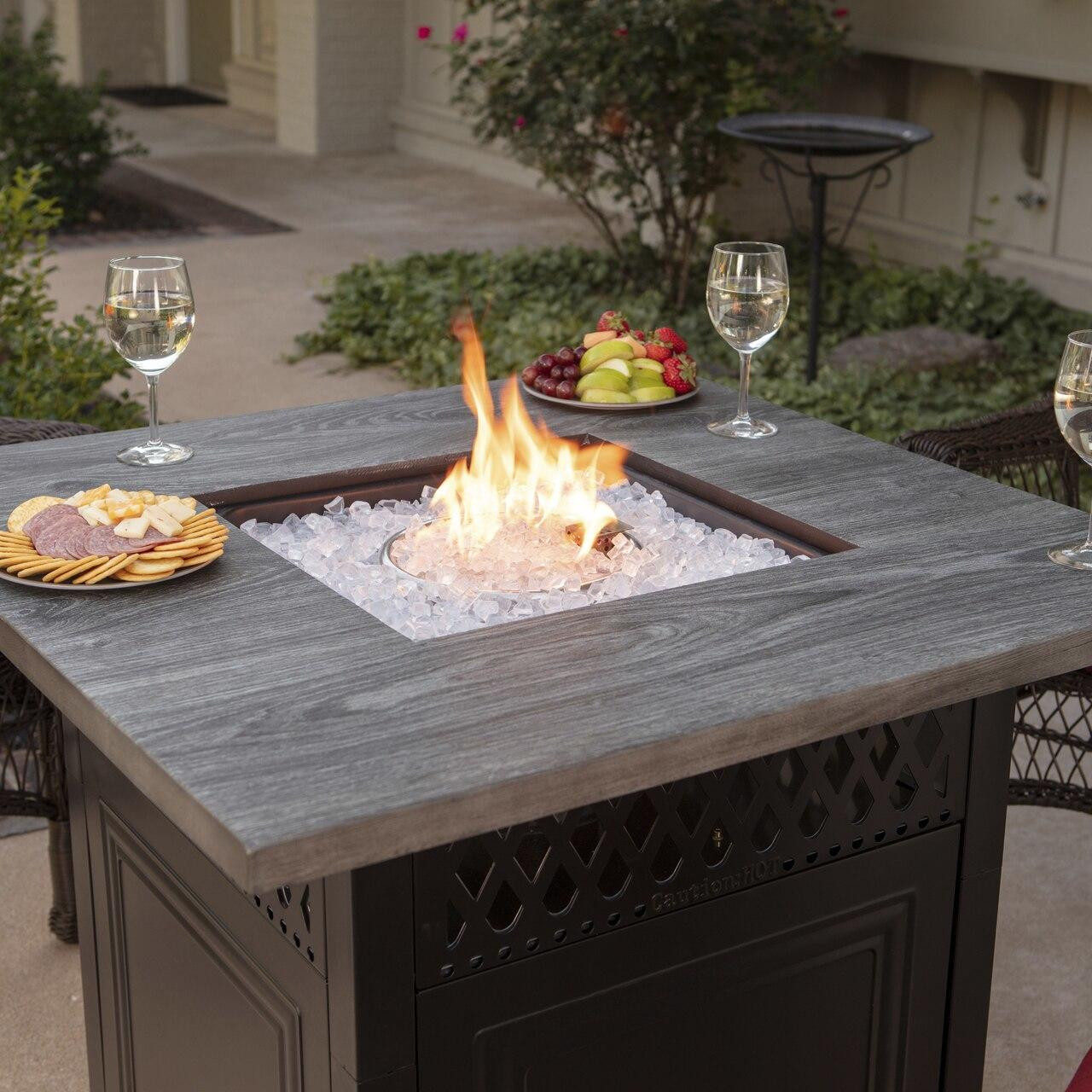 The Dakota Dual Heat LP Gas Outdoor Firepit with Wood Look Resin