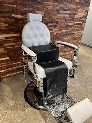 AYC Styling Chair Booster Seat Cushion on a barber chair