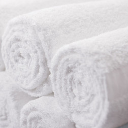 Standard Textile Classic Cam White Salon & Spa Towels rolled up